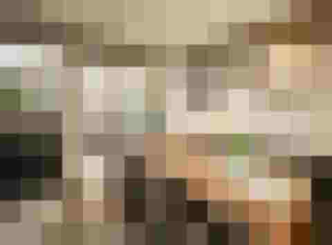 Stilvolles Esszimmer im Luxus-Refugium Hochgugg mit Küche und komfortabler Sitzgelegenheit.